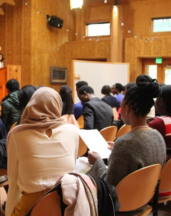 members listening in a summit session